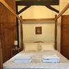 Holly Cottage - bedroom with four-poster bed